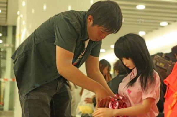 chinese-man-adopts-doll-daughter-9