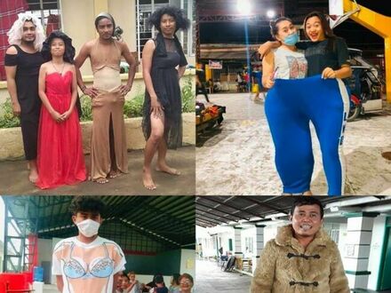Filipińczycy po ewakuacji z powodu wybuchu wulkanu Taal z poczuciem humoru przymierzają ubrania, które dostali z pomocy humanitarnej