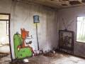 Street art w opuszczonym domu