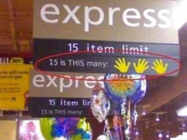 Żeby Amerykanom się nie myliło - nowy znak przed ekspresową kasą w Walmarcie